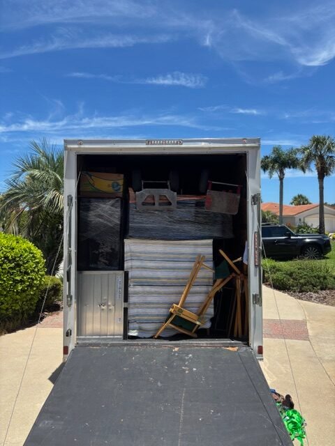 Professionally packed items in moving truck.