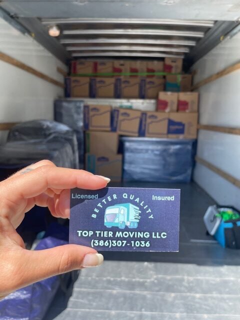 Top Tier Moving LLC business card.