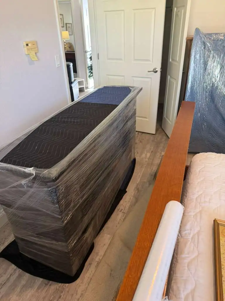 Furniture wrapped for safe transport.