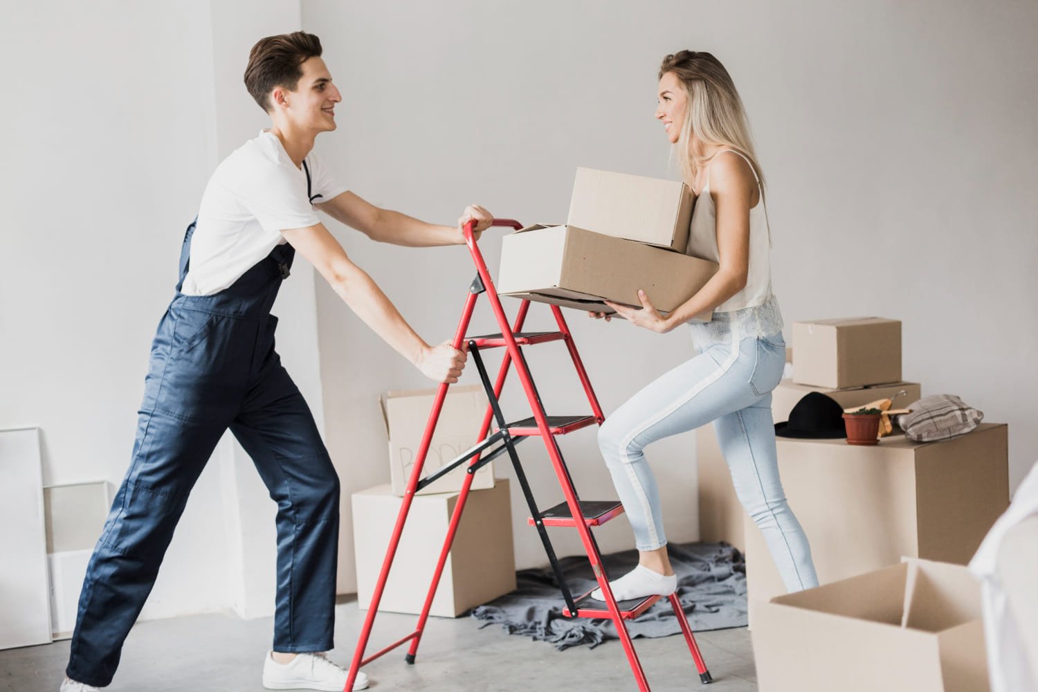 men and women with box in hand